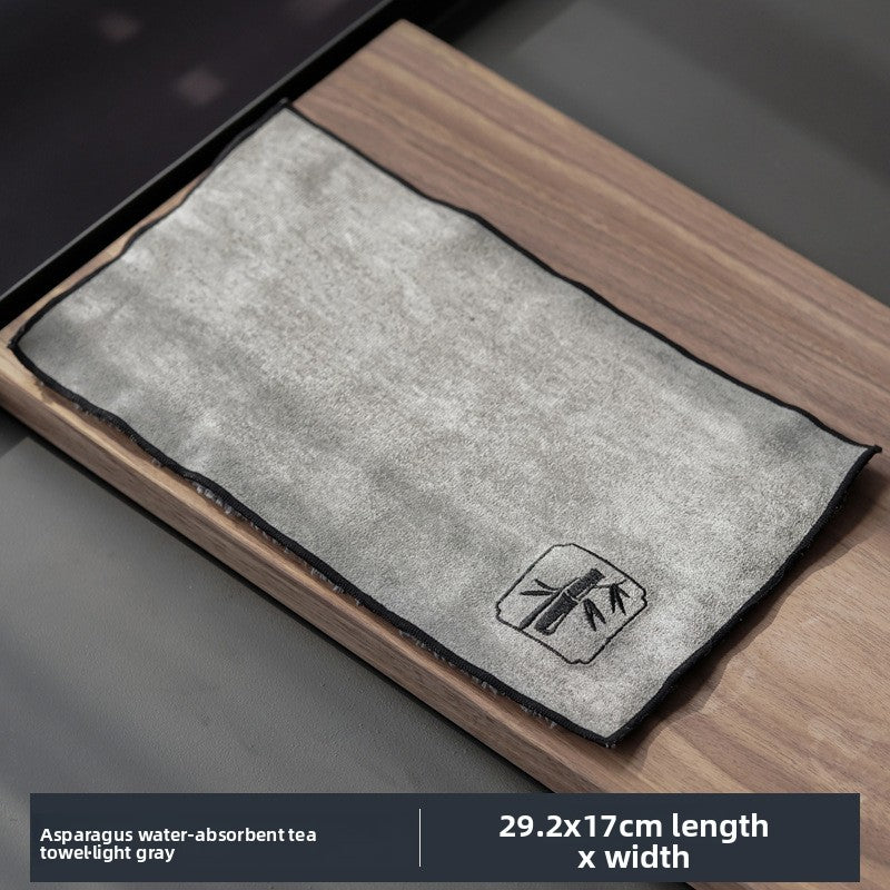 Light gray tea cloth with a bamboo motif on a walnut tray, labelled 29.2 by 17 cm