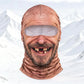 Printed elder face balaclava Elder1 with stubble beard and gap-toothed grin against a snowy mountain backdrop
