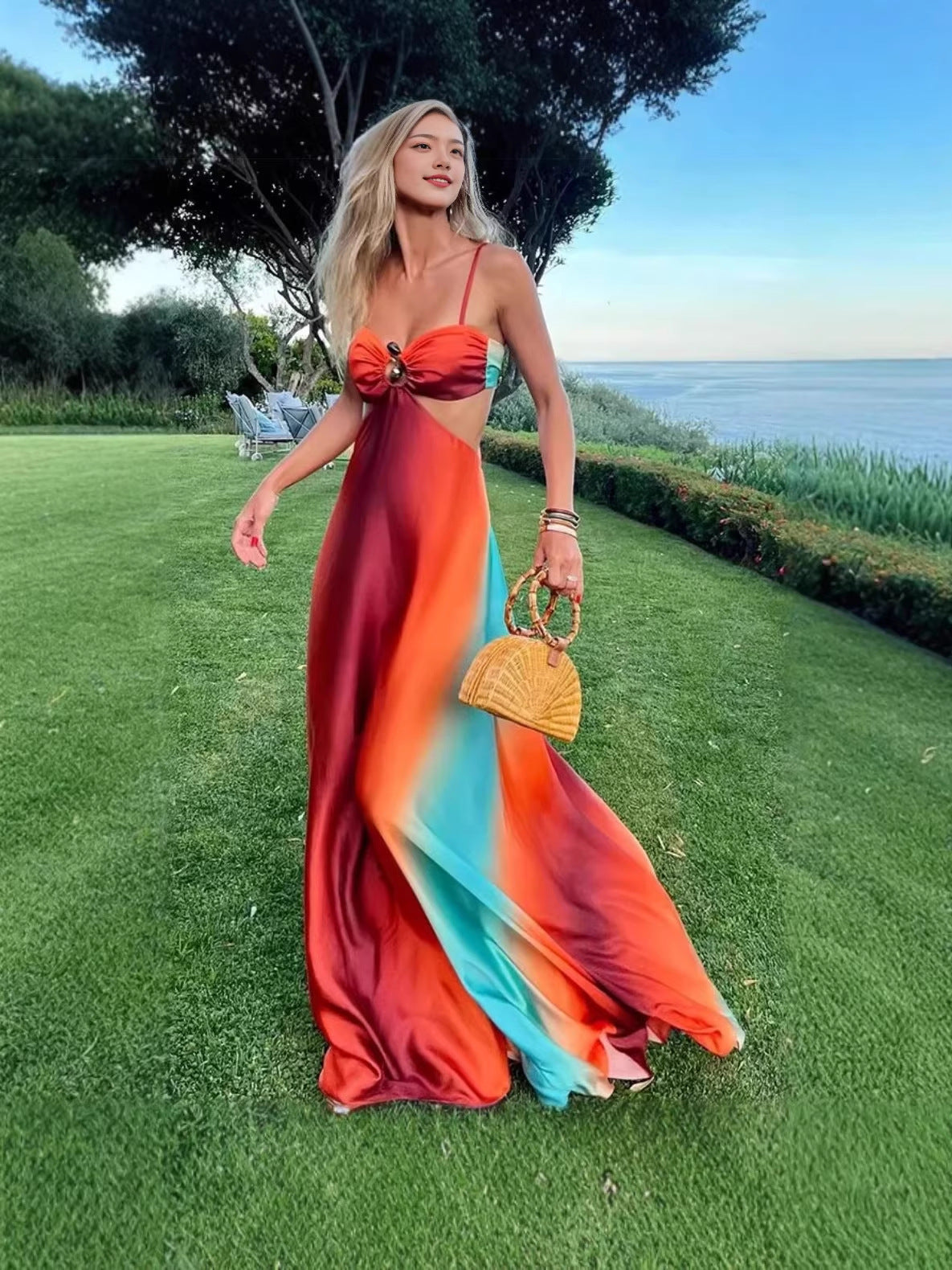 Gradient satin halter dress worn on a warm day, relaxed in-use moment