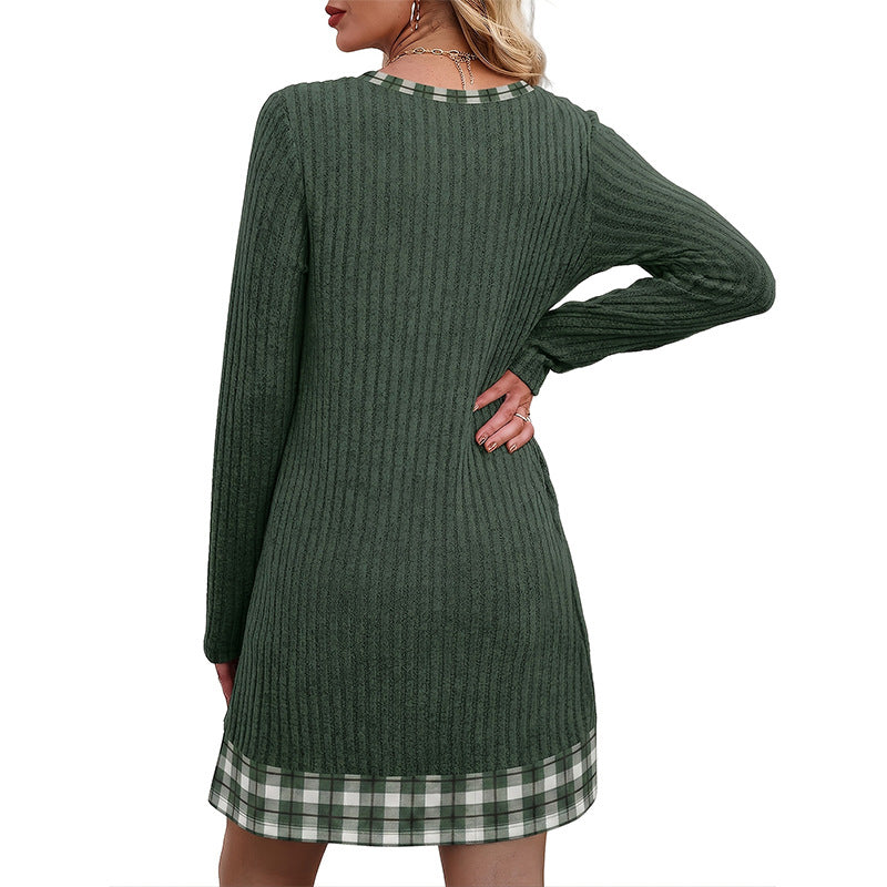 Back view of the grayish green ribbed knit dress with long sleeves and a green and white plaid hem