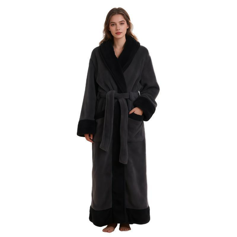 Woman wearing a long dark gray flannel bathrobe with black shawl collar, cuffs and hem, dark gray variant