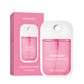 Pink strawberry POWER MIST paper box and matching flat 45 ml hand spray bottle on a white background