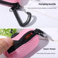 Pet waste bag dispenser pouch, pouch clipped to a dog lead on a walk