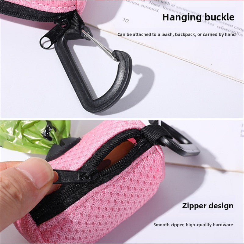 Pet waste bag dispenser pouch, pouch clipped to a dog lead on a walk