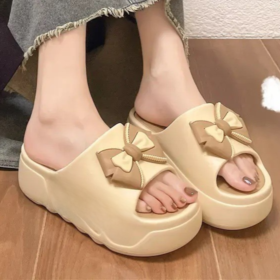 Womens platform slides, khaki bow platform slide from the side