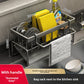 Kitchen sink caddy holding a dish brush, sponge and steel wool ball in its wire basket