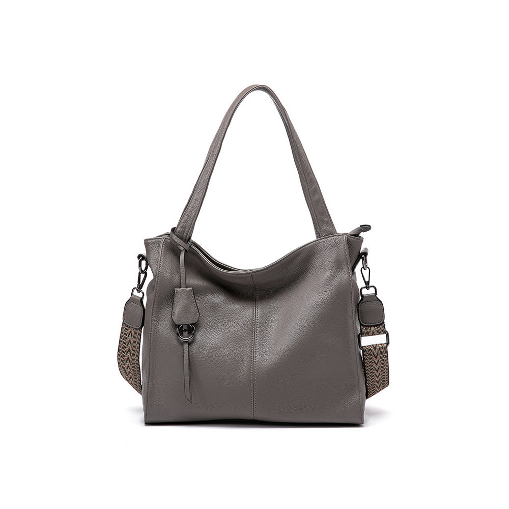 Elephant gray soft leather shoulder bag with woven chevron crossbody strap front view