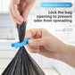 Blue clip sealing the opening of a black garbage bag