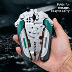Folding multifunction wire stripping plier held folded in a hand, green and gray handle