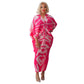 Pleated batwing V neck abstract print midi dress on a standing model, front view