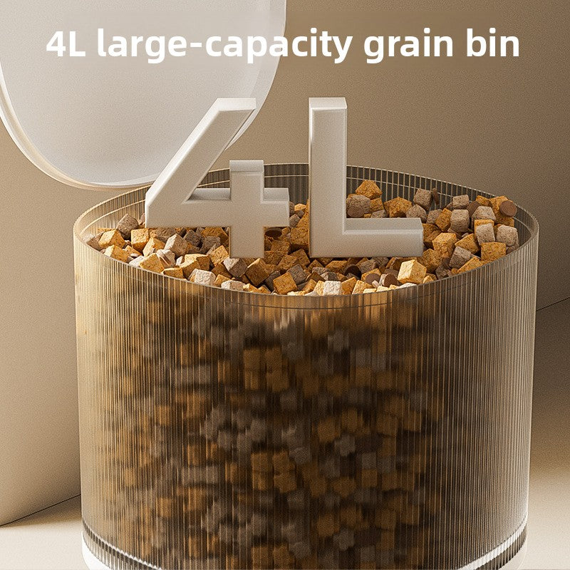 Clear 4L grain bin of the automatic pet feeder filled with dry food