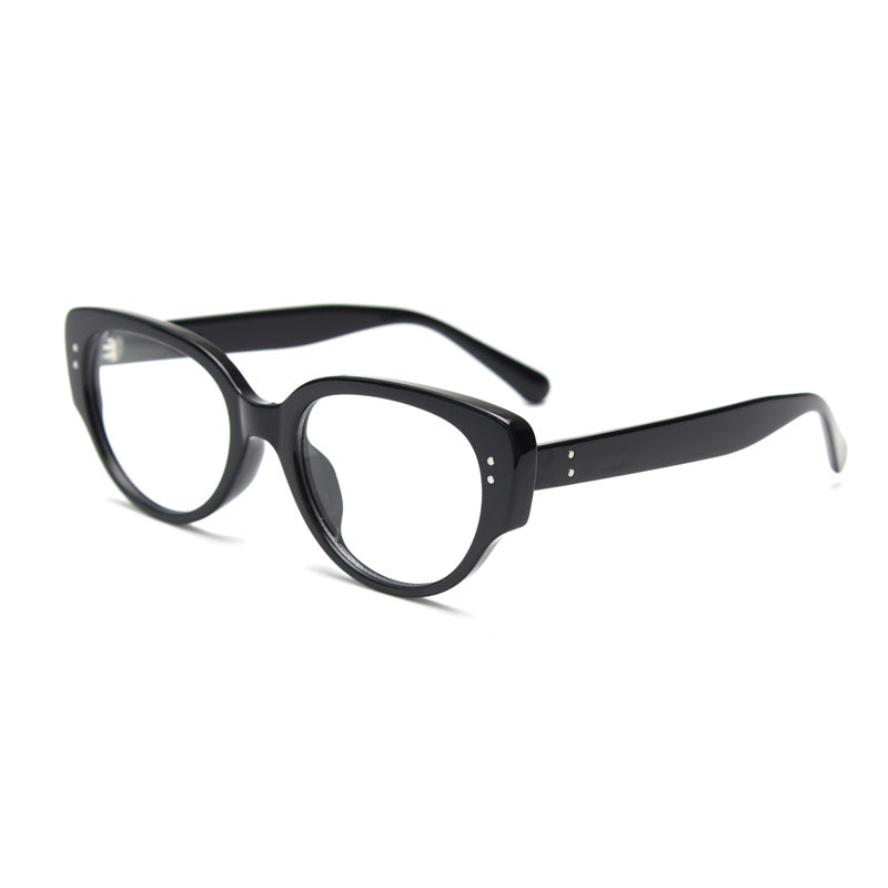 Bright black oval cat eye TR90 frame with clear lenses at a three quarter angle