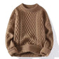 Cable twist knit crewneck sweater shown flat, roomy body with dropped shoulder line