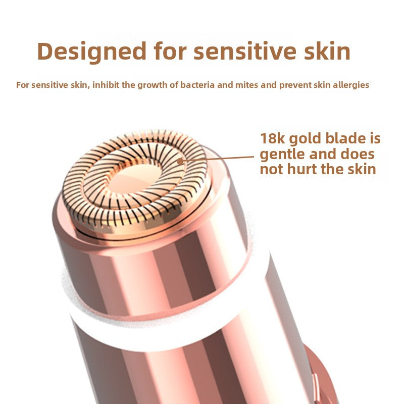 Close up of the round 18K gold plated foil shaver head on the rose gold and white body