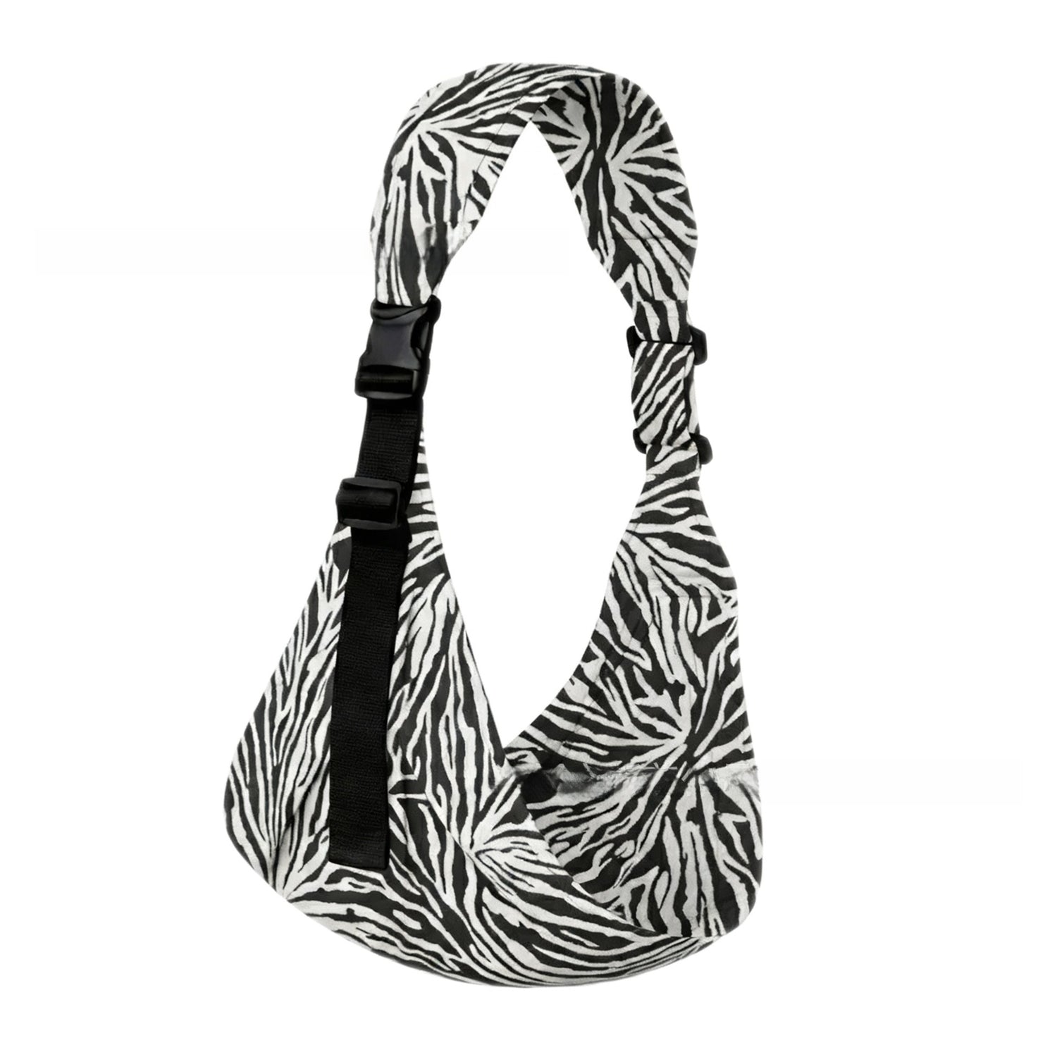 Printed one-shoulder baby sling carrier shown in soft natural light