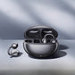 Beige warm skin open ear clip earbuds shown in their charging case