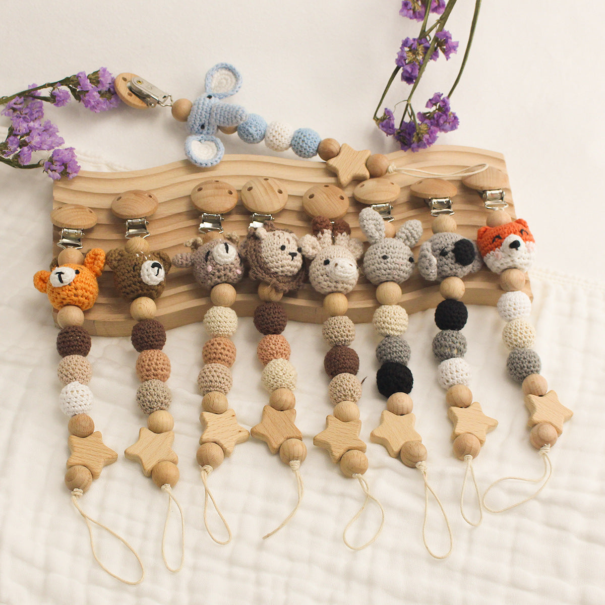 Cotton and wood pacifier chain teether front view with clip