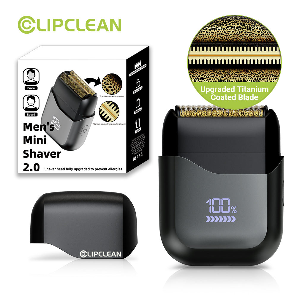 Black portable foil electric shaver with dual foils, center trimmer and LED display