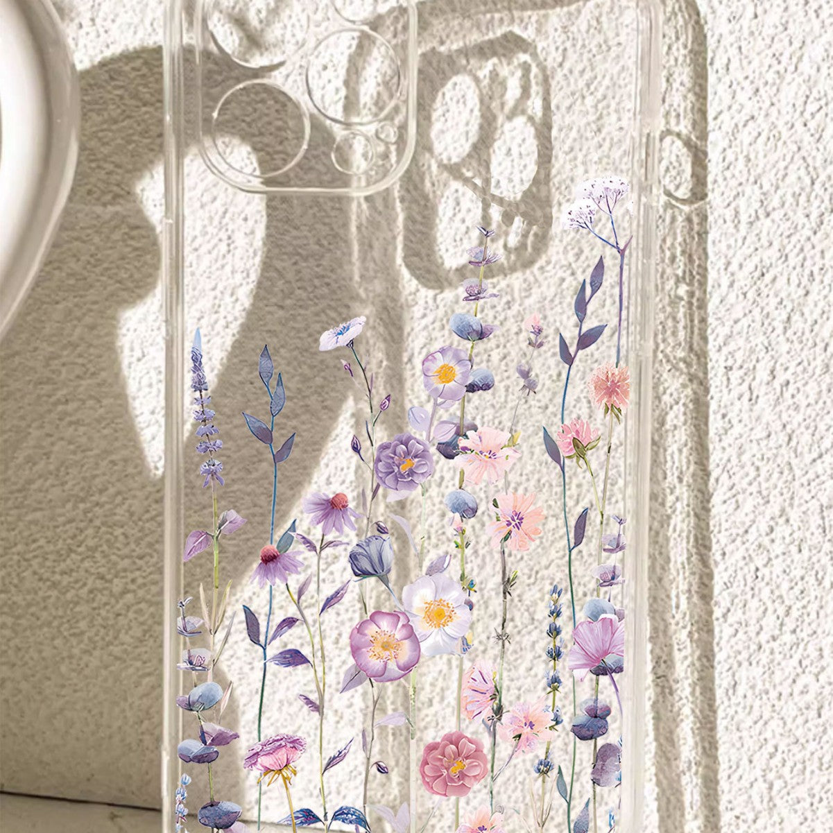 Soft clear TPU phone case with a floral print and cushioned corners