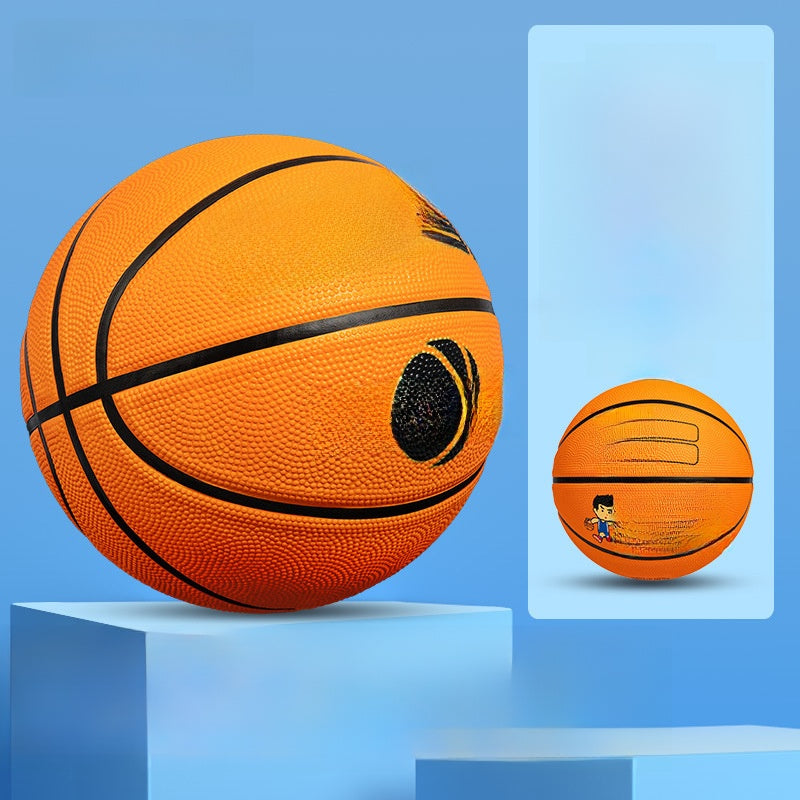 Orange and yellow paneled kids basketball shown close up on a studio background