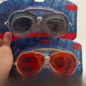 Two blister packs of aviator swim goggles in grey and red with printed feature icons