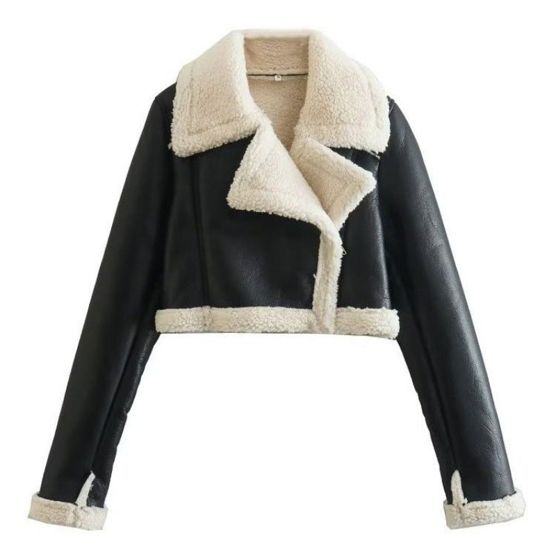 Side view of the cropped vegan leather sherpa aviator jacket, rolled fleece cuff at the wrist