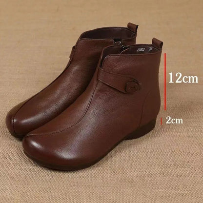 Pair of brown soft leather ankle boots with a side strap and measure marks showing a 12 cm shaft and a 2 cm heel