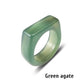 Green agate stone ring with a rectangular face on a white background