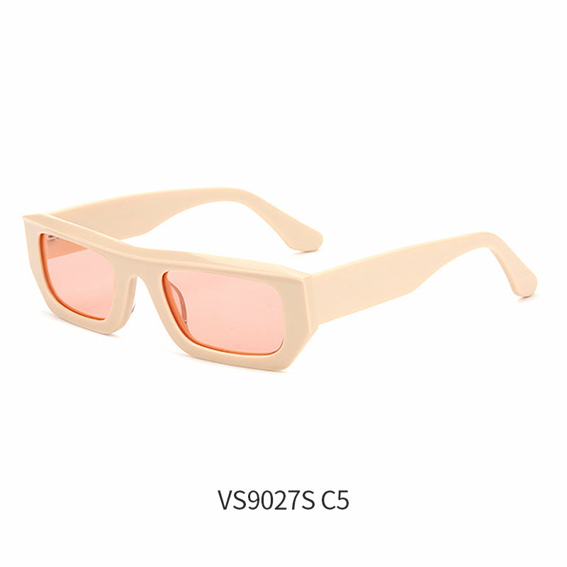 Translucent green rectangular sunglasses at a three quarter angle