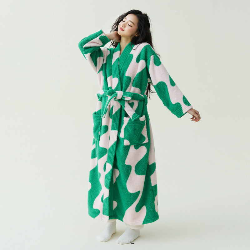 Green Wavy Print with Pants set, emerald and pale pink wave fleece robe with pockets, worn by a model