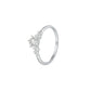 Sterling silver cubic zirconia ring on a finger, bright faceted round center stone catching soft indoor light