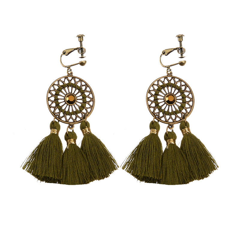 Vintage boho tassel clip-on earrings for non pierced ears, zinc alloy drop pair photographed on white background