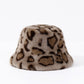 Taupe leopard print plush bucket hat with brown spots and a dome crown