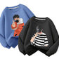 Close view of a smiley and Lucky slogan print on a boys orange crew neck sweatshirt