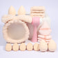 Velvet triangle powder puffs and round puffs beside teardrop foam makeup sponges