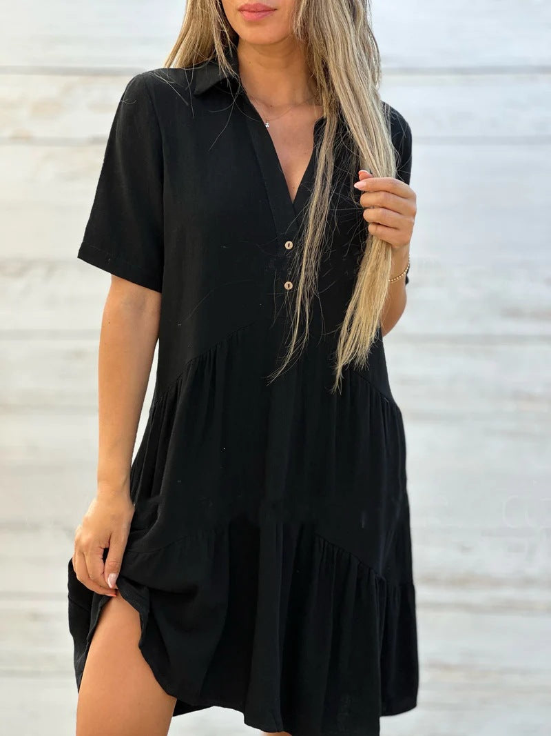 White short sleeve cotton and linen tiered shirt dress showing the soft cotton and linen blend drape