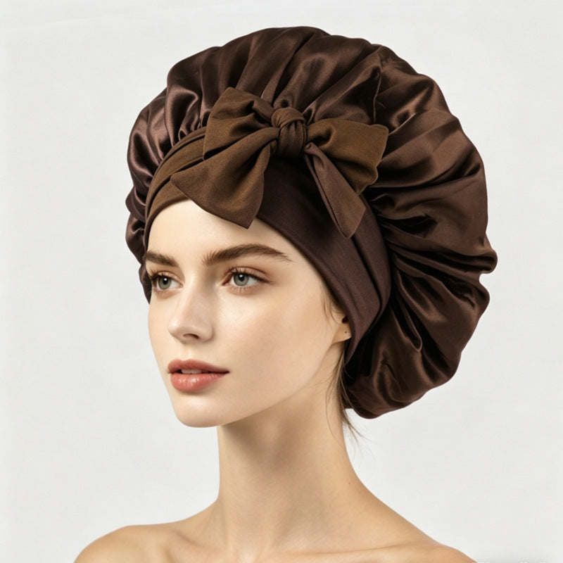 Smooth satin sleep bonnet with long ties, roomy enough for curls or braids