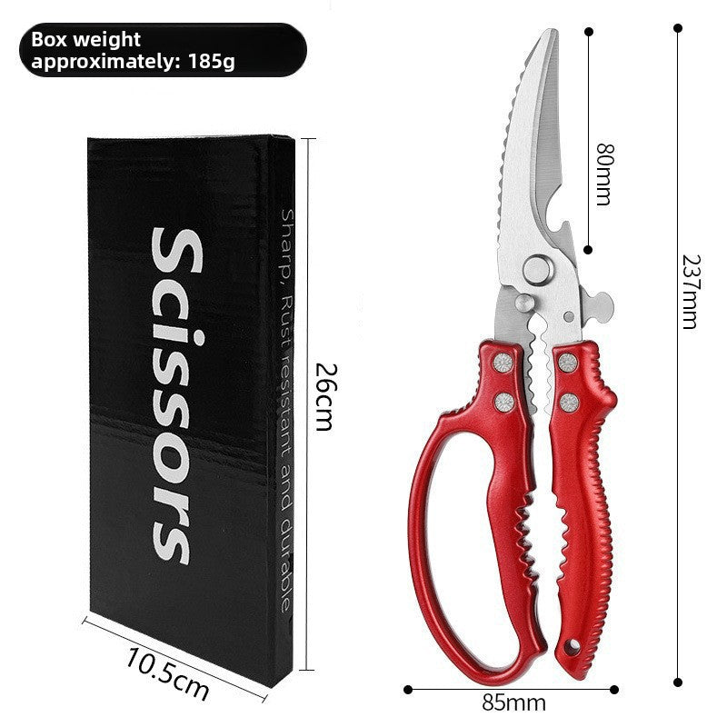 Red handled kitchen bone shears beside a black gift box