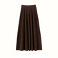 Coffee brown ribbed knit tiered midi skirt with a wide ribbed waistband, flat front view on white