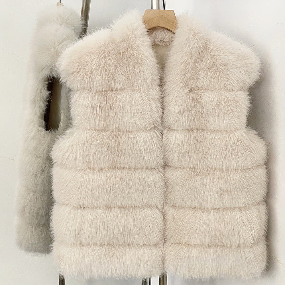 Beige White tiered vegan fur sleeveless vest in size S, front view on a wooden hanger