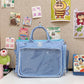 Roomy clear pocket shoulder bag in soft nylon with an adjustable detachable strap
