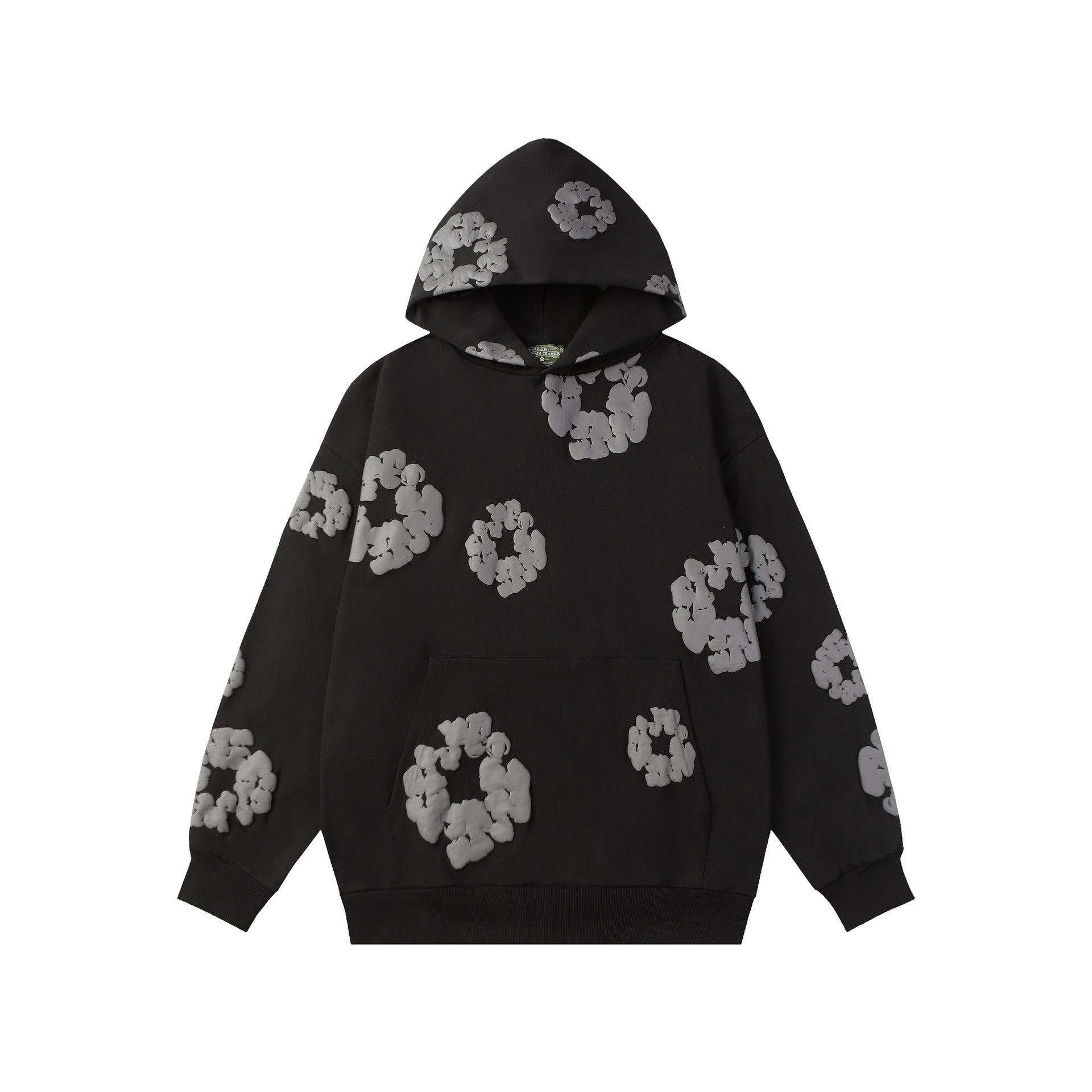 Cotton wreath print hoodie photographed in a modern interior setting