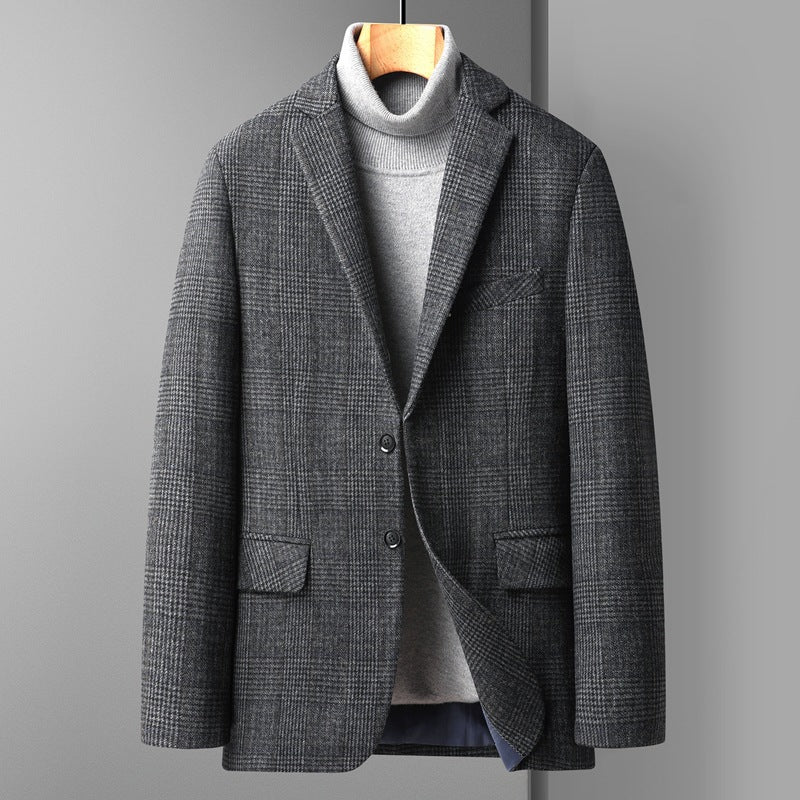 Camel plaid wool blend blazer shown over a grey rollneck knit on a hanger