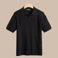 Green knitted short sleeve polo with an open lapel collar on a model