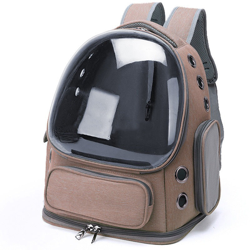 Brown capsule pet carrier backpack with clear dome, front zip pocket and side vent holes on white