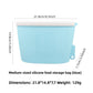 Reusable blue silicone food storage bag, 800ml size, standing sealed upright