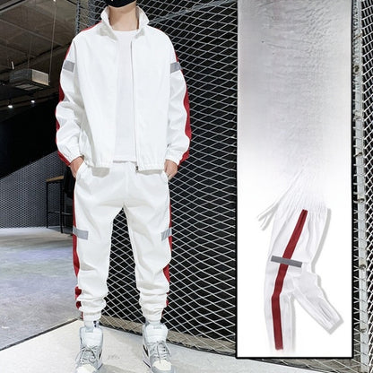 White hooded tracksuit set with red side stripe, full-zip jacket and joggers on model