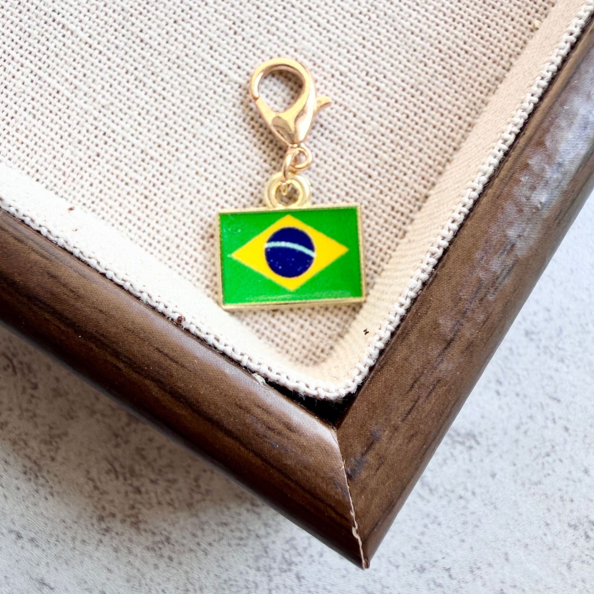 Brazil enamel country flag keychain charm on a gold tone lobster clasp for keys and bags