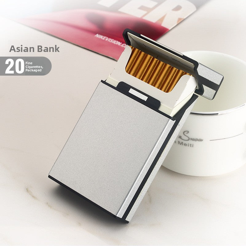 Silver aluminum cigarette case with flip top open over a row of slim cigarettes