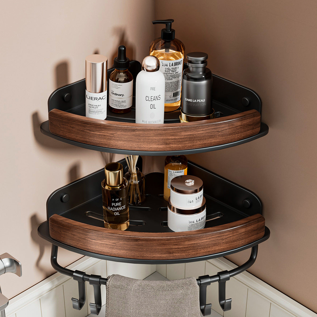 Cream walnut bathroom corner organizer with a hanging rod and a folded towel